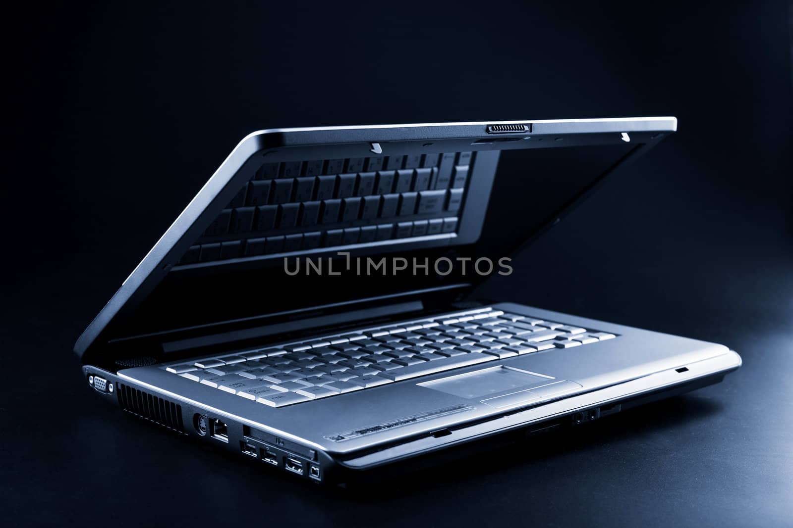 modern notebook over black background