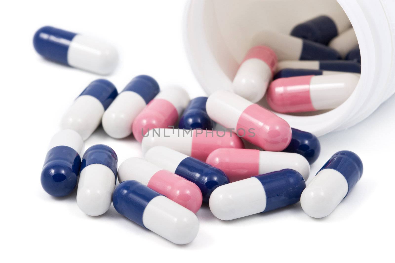 blue and pink capsule pills