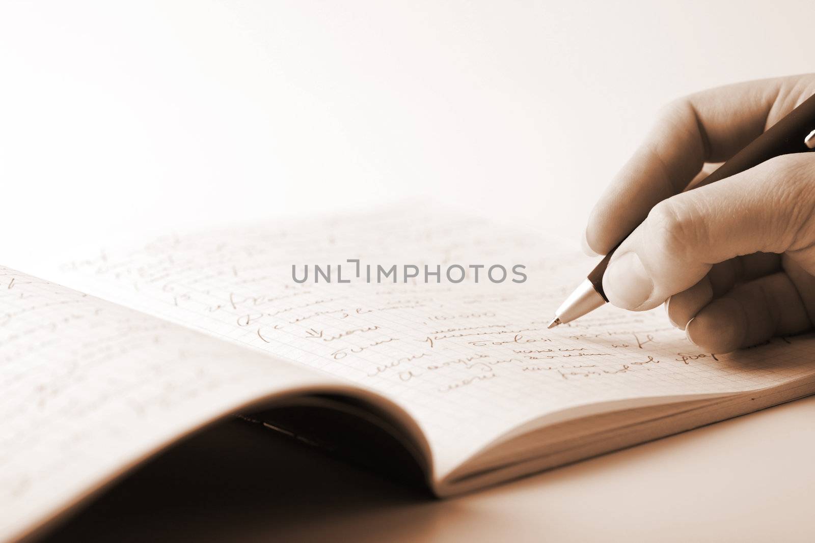 hand writing in notebook
