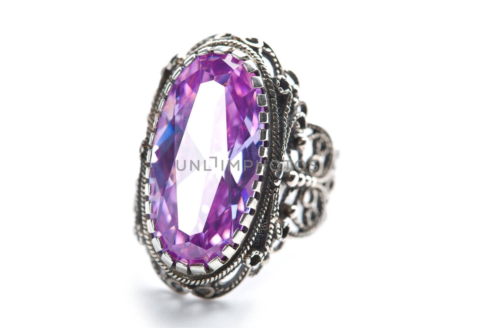 silver ring with huge amethyst isolated