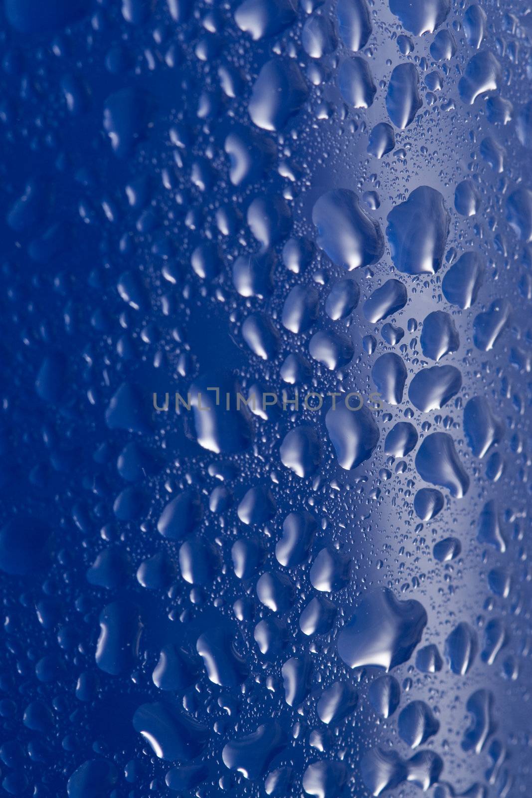 water drops on blue glass