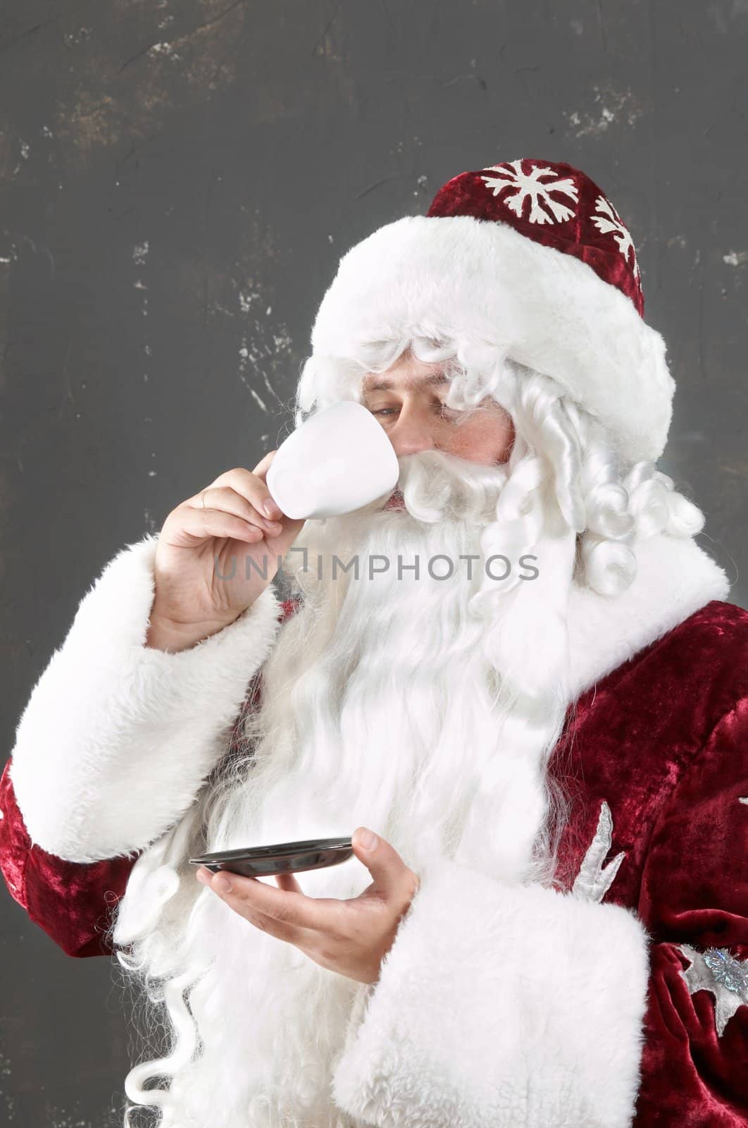 An image of Santa Claus drinking tea