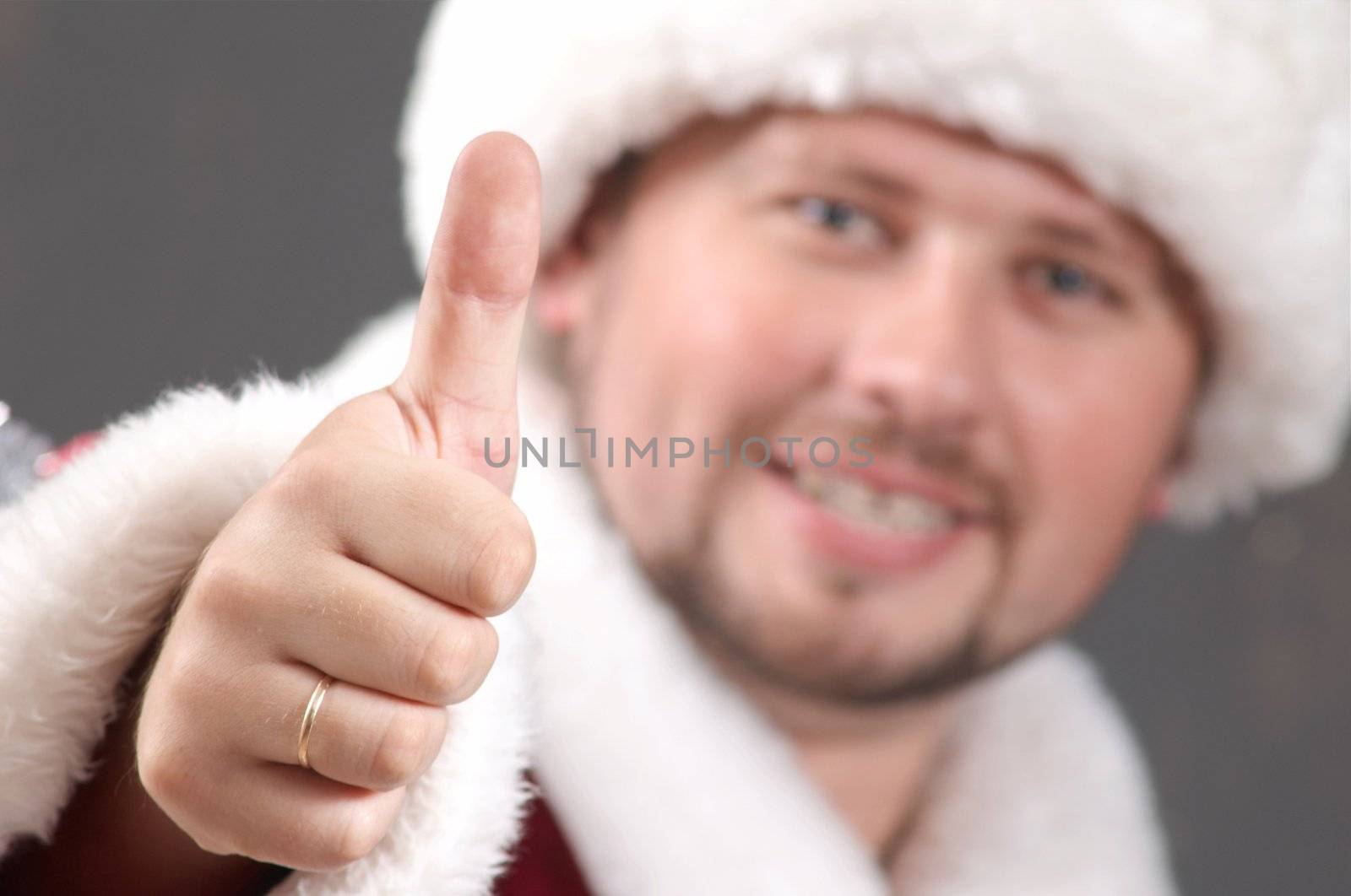 Santa Claus showing his thumb