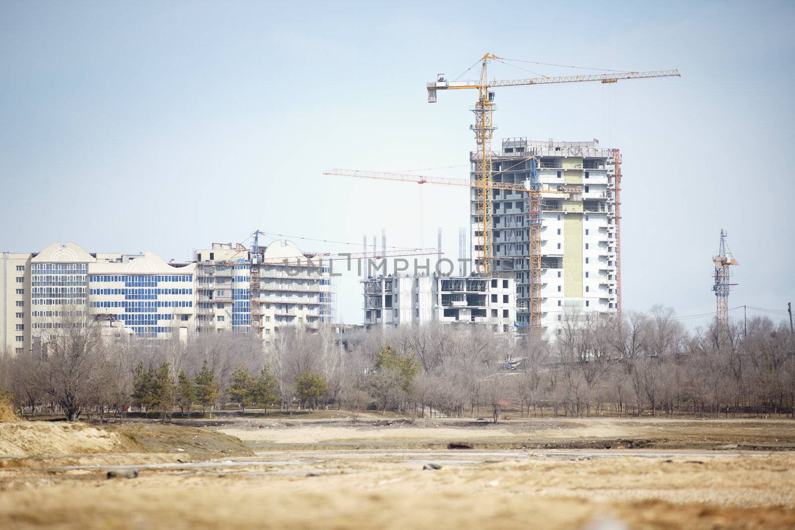 View on construction activity of residential buildings. Natural light and colors