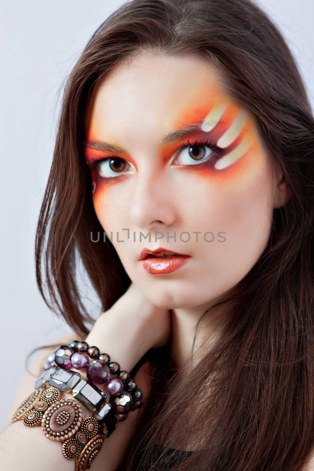 A beautiful lady with a vivid fantasy make-up.