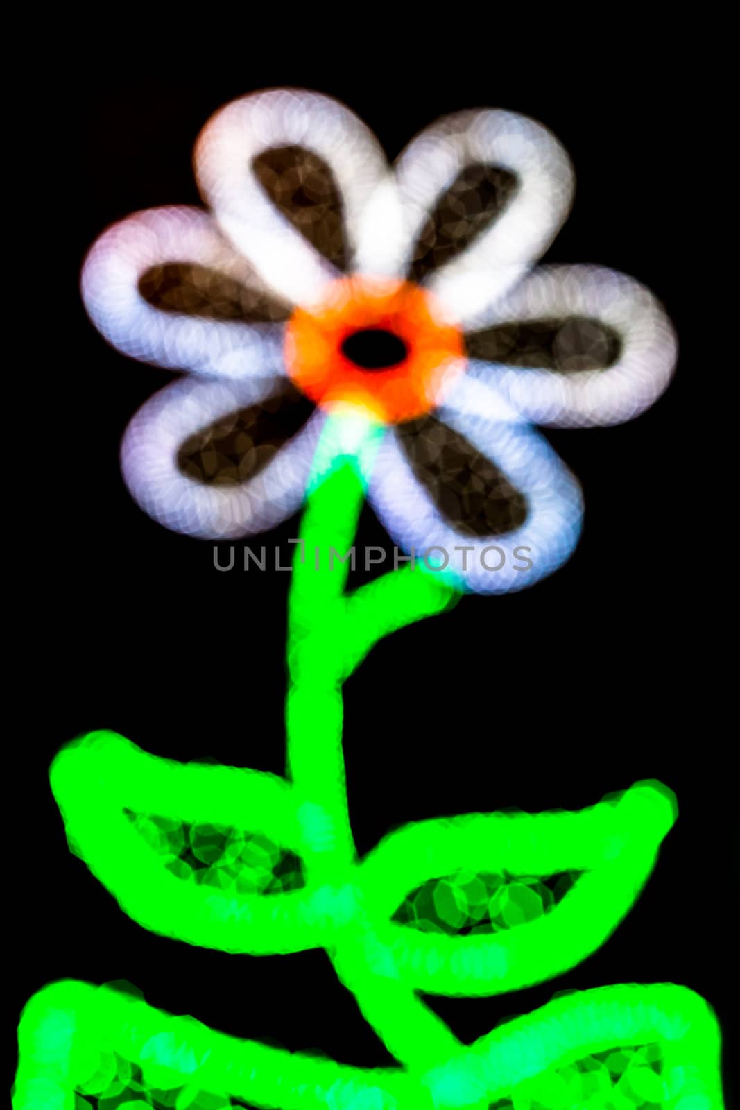 Composition of a flower made by blurred lights