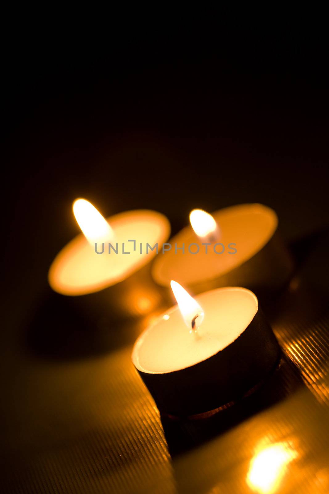 candles burning in the dark
