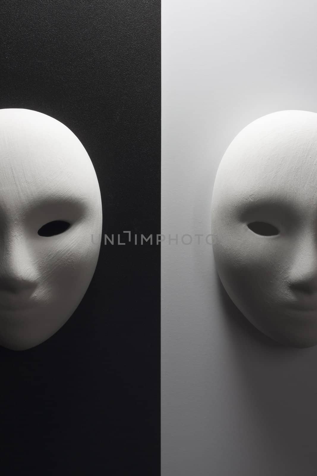 plaster mask in studio, when compared to the good or bad.