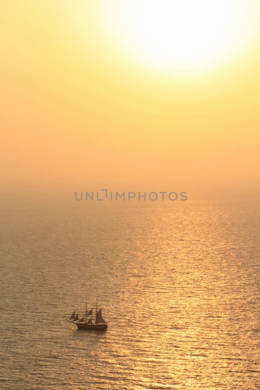Old sailing boat at sunset by Elenaphotos21