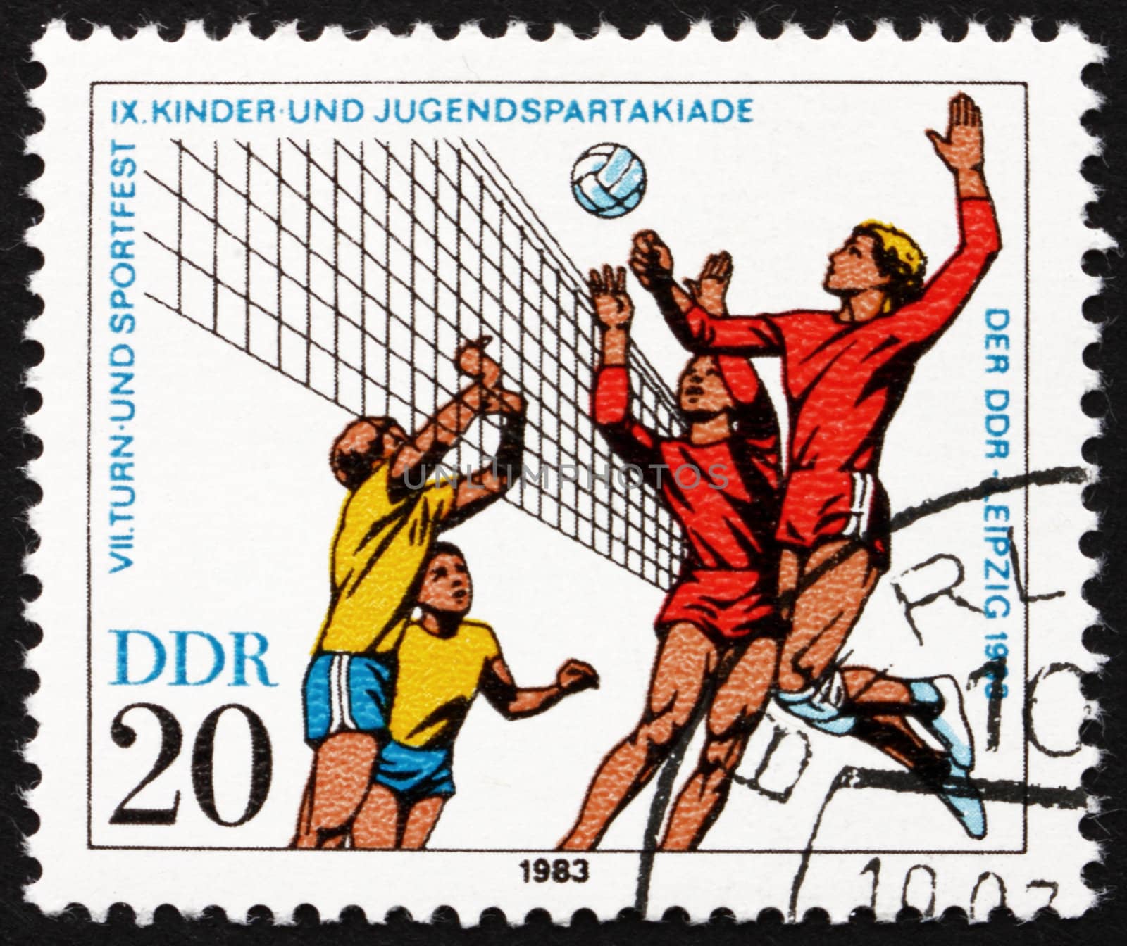 GDR - CIRCA 1983: a stamp printed in GDR shows Volleyball, 9th Children�s and Youths� Spartakiade, circa 1983