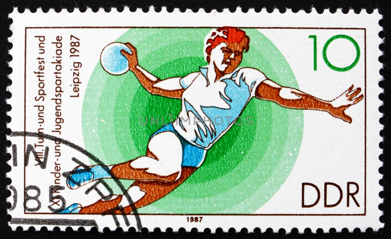 GDR - CIRCA 1987: a stamp printed in GDR shows Handball, 11th Children�s and Youths� Spartakiade, circa 1987