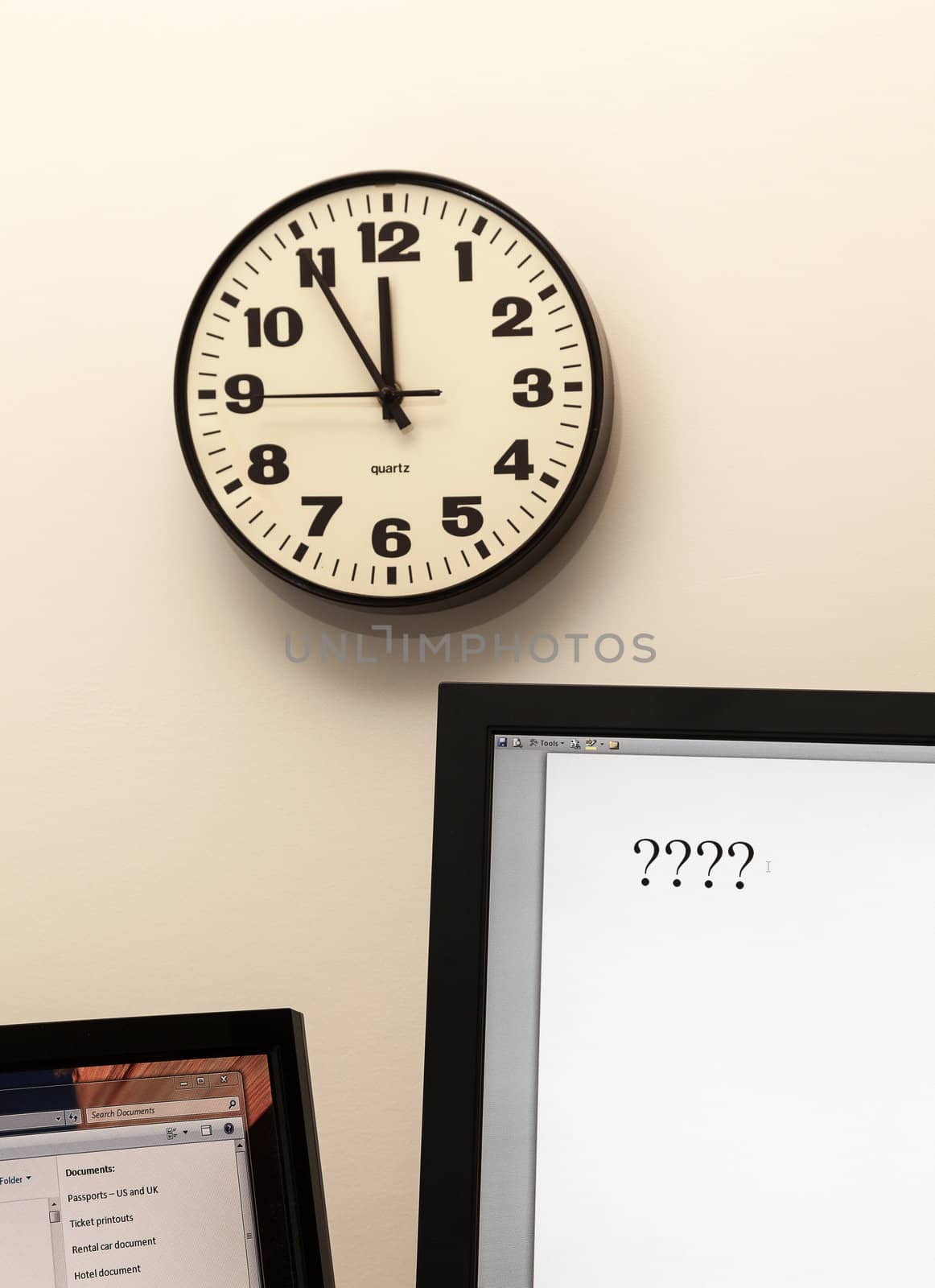 Concept for urgent decision making with clock on paper and question mark on pad