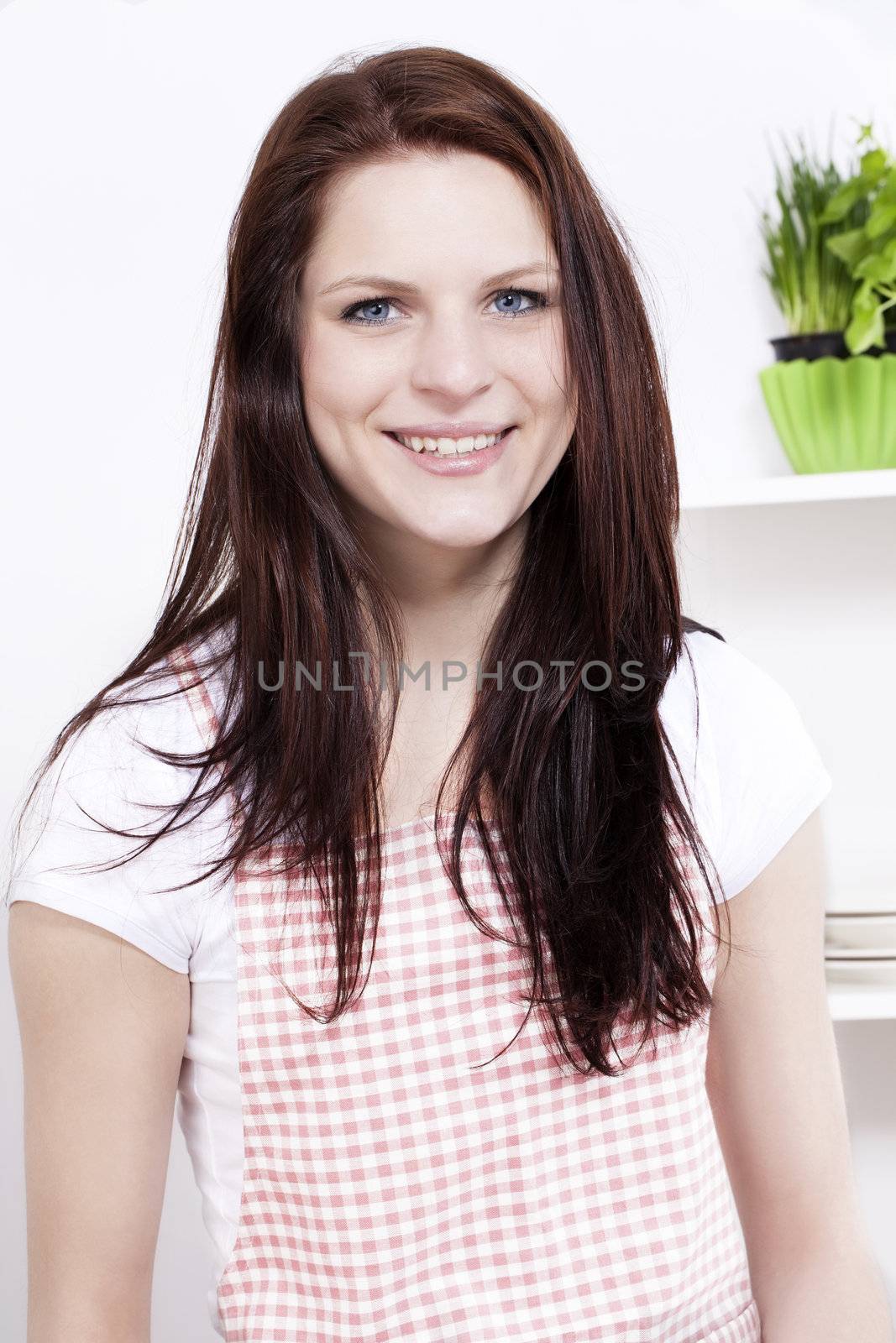 portrait of a young woman in kitchen by RobStark