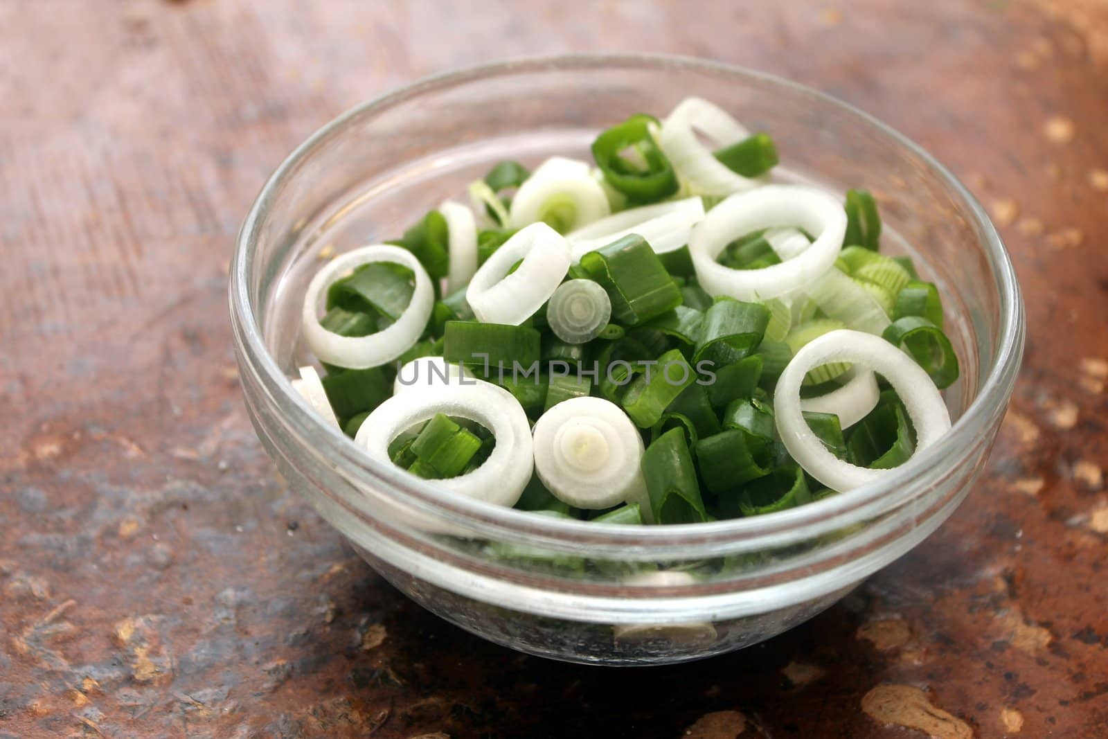 spring onion slices in a glass bowl
