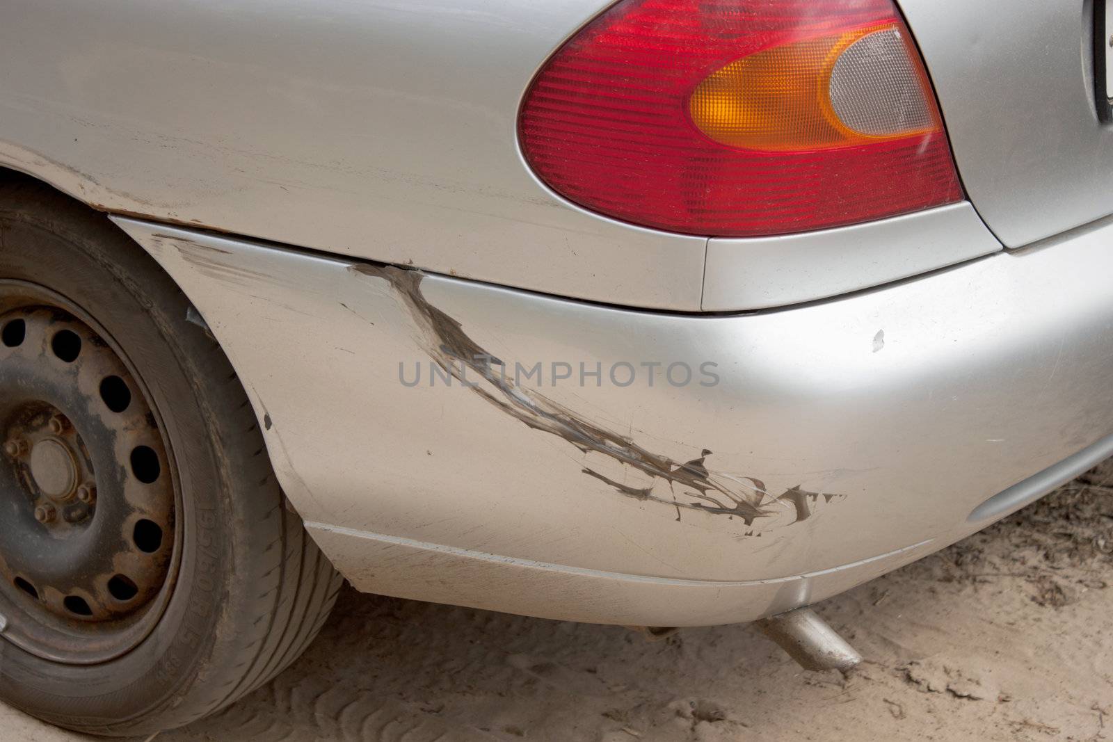 Damage to the bumper of the car