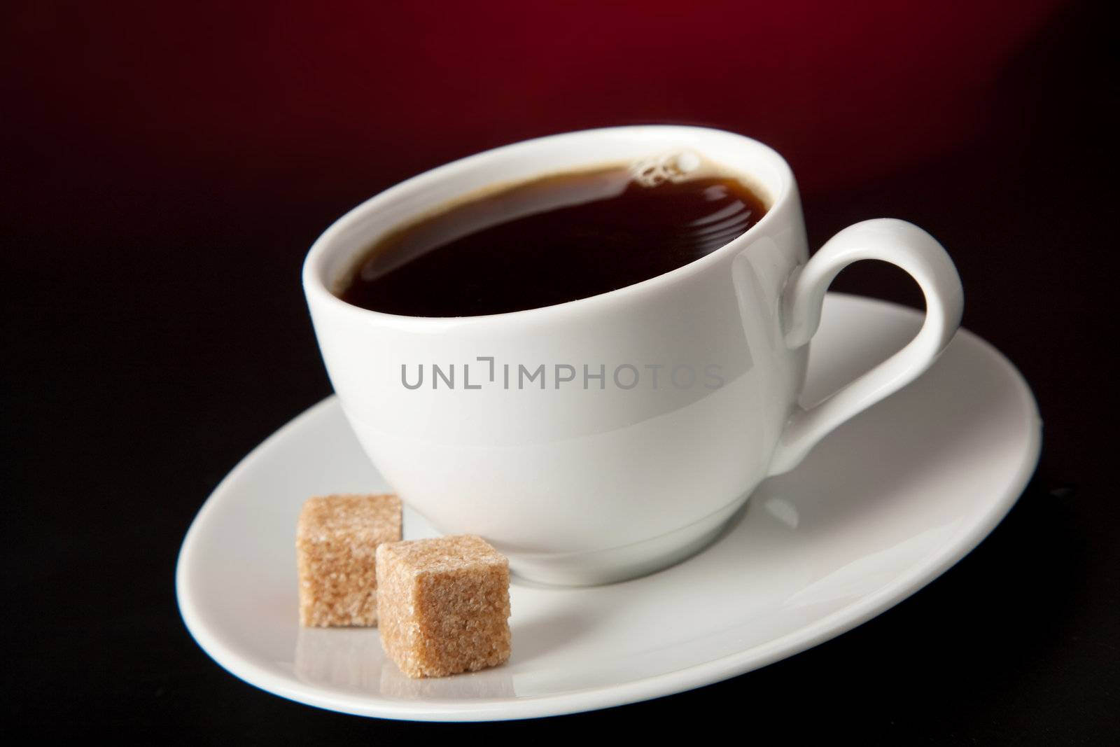  cup of coffee over black background