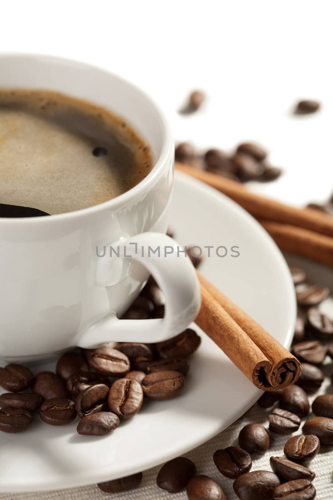 cup of coffee and roasted beans isolated
