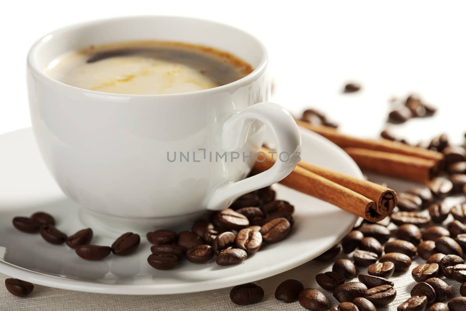 cup of coffee and roasted beans isolated 
