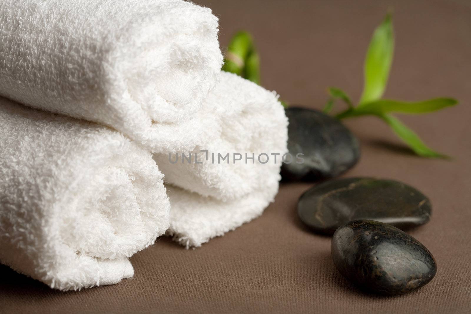 spa stones and towels