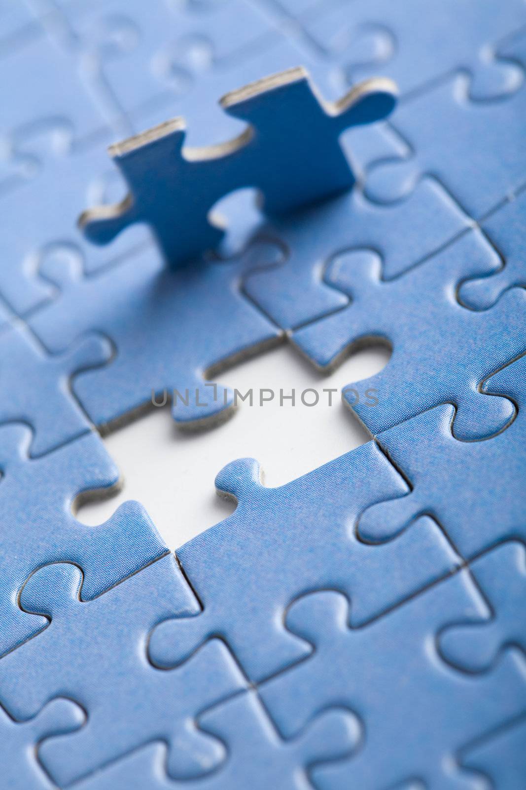 abstract puzzle background with one piece missing
