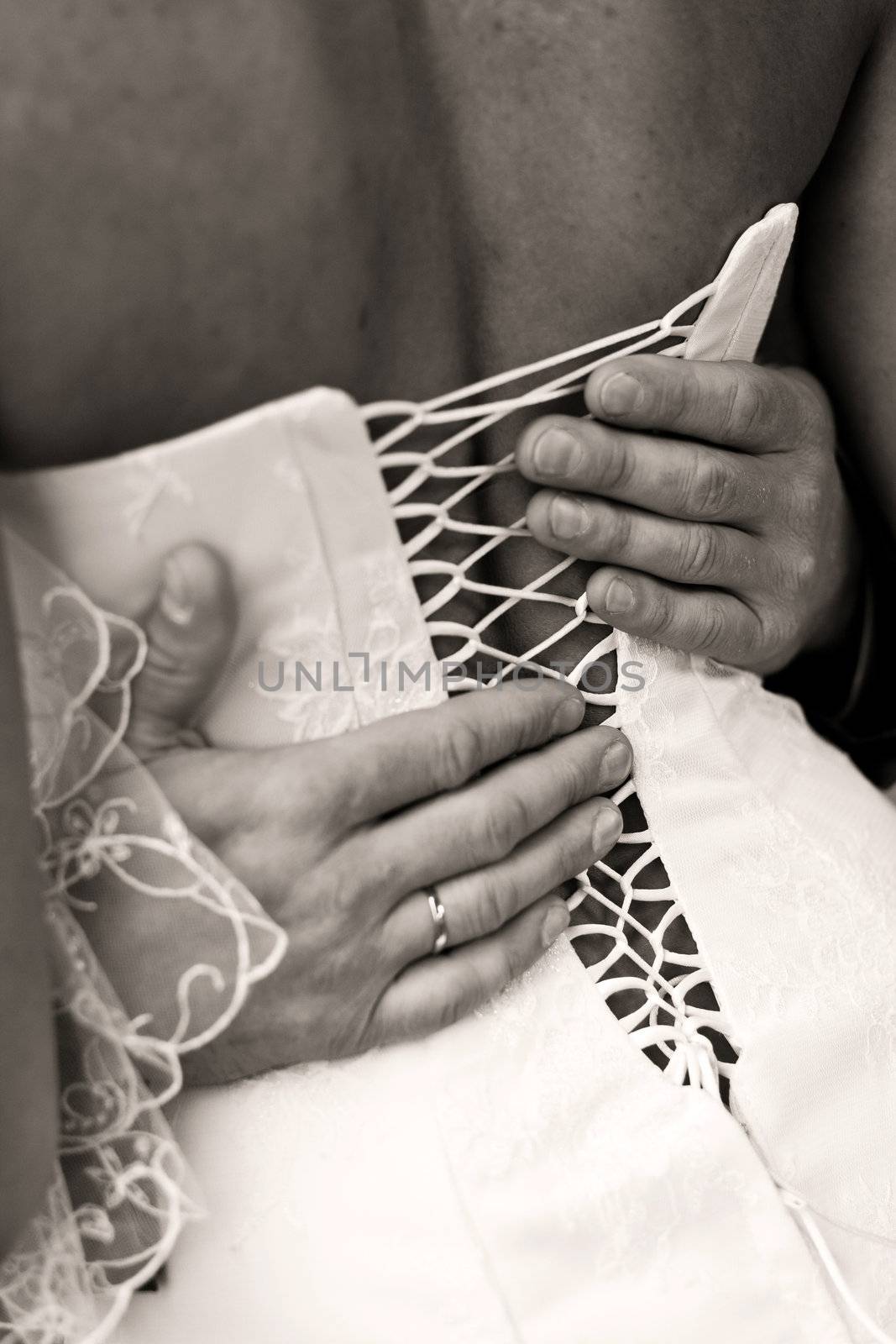 groom holding bride