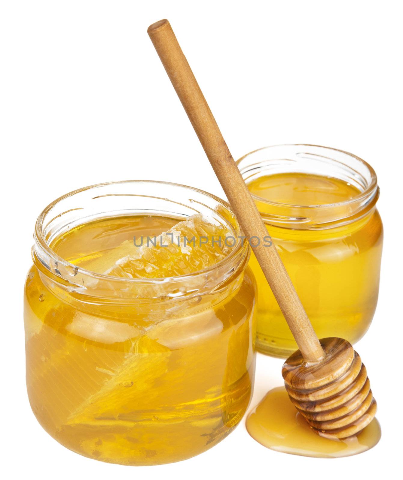 honey in jars isolated