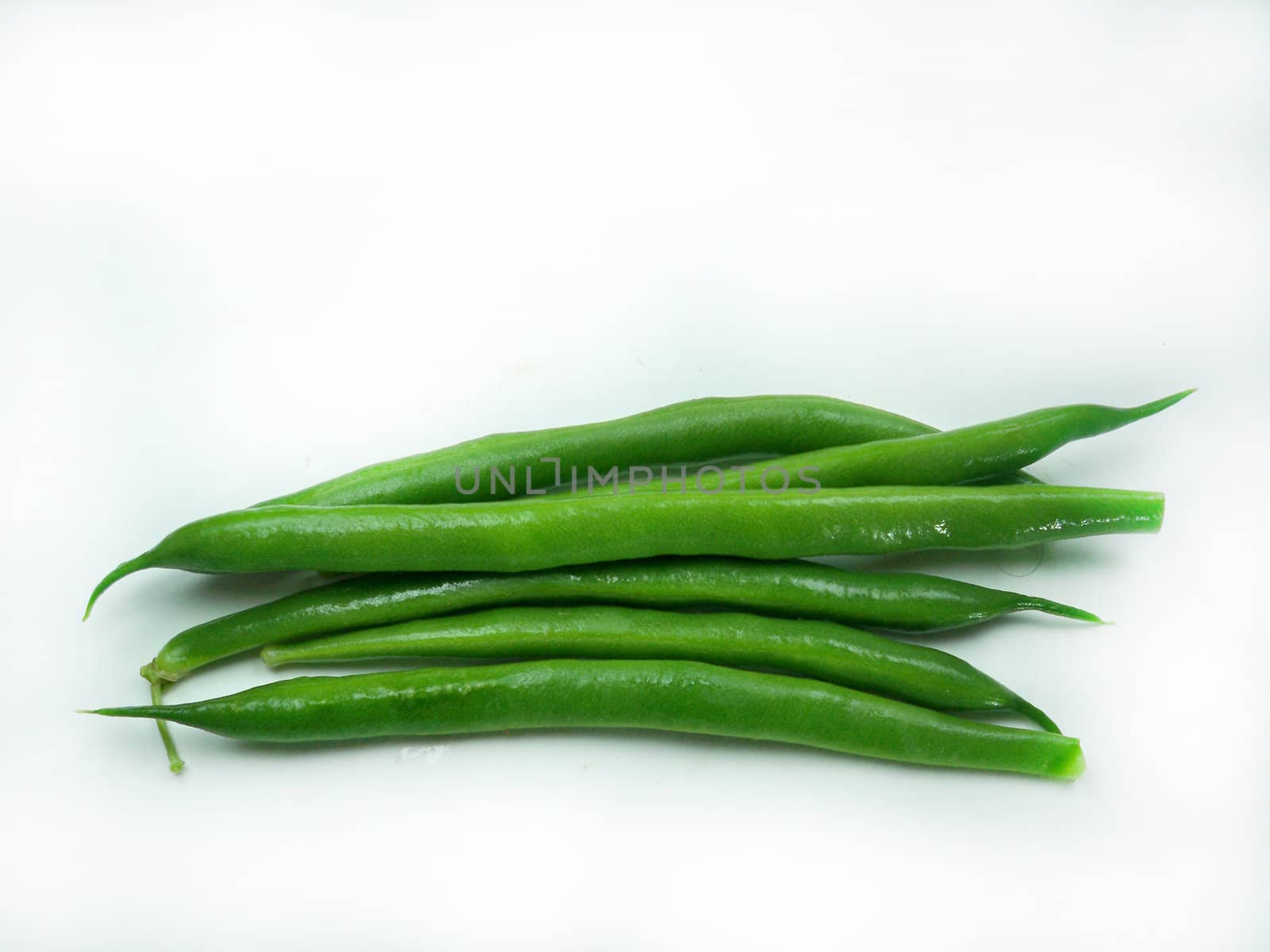Green beans isolated on a white background.