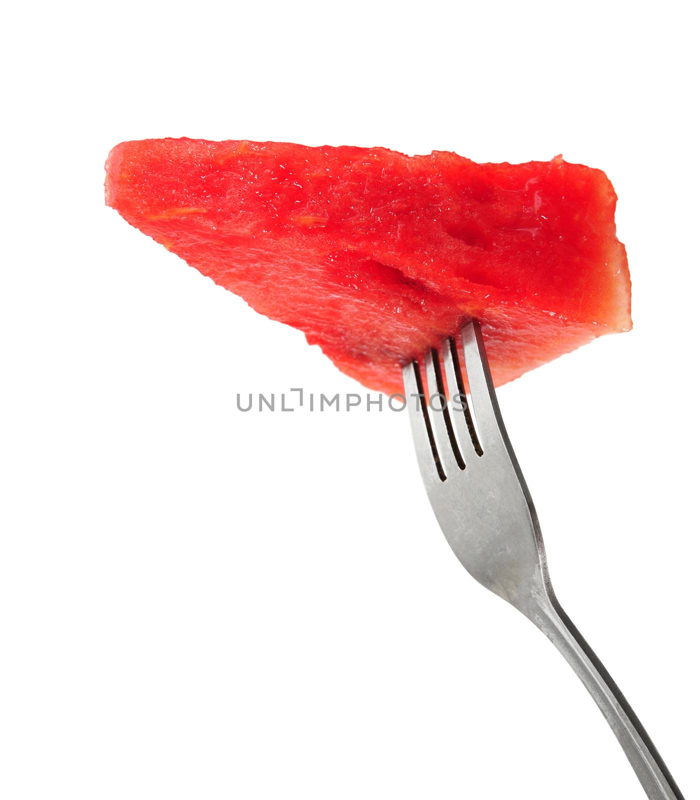 Watermelon slice on a fork