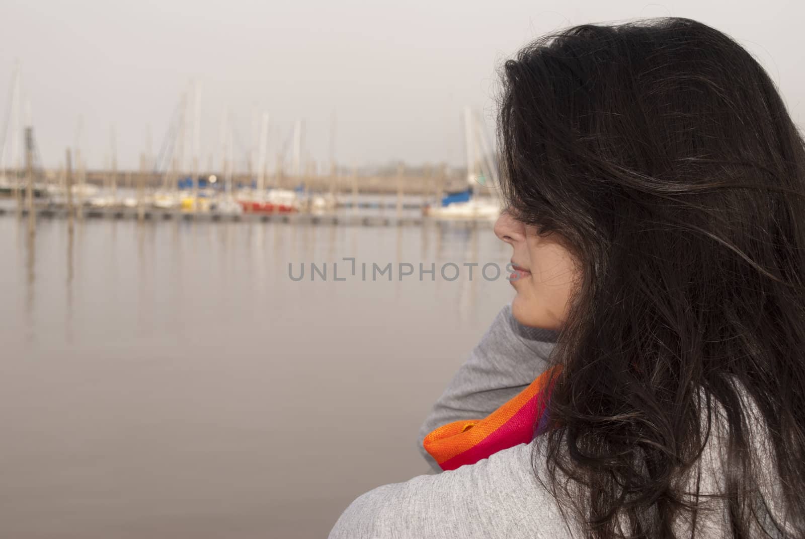 Woman looking at the river by lauria