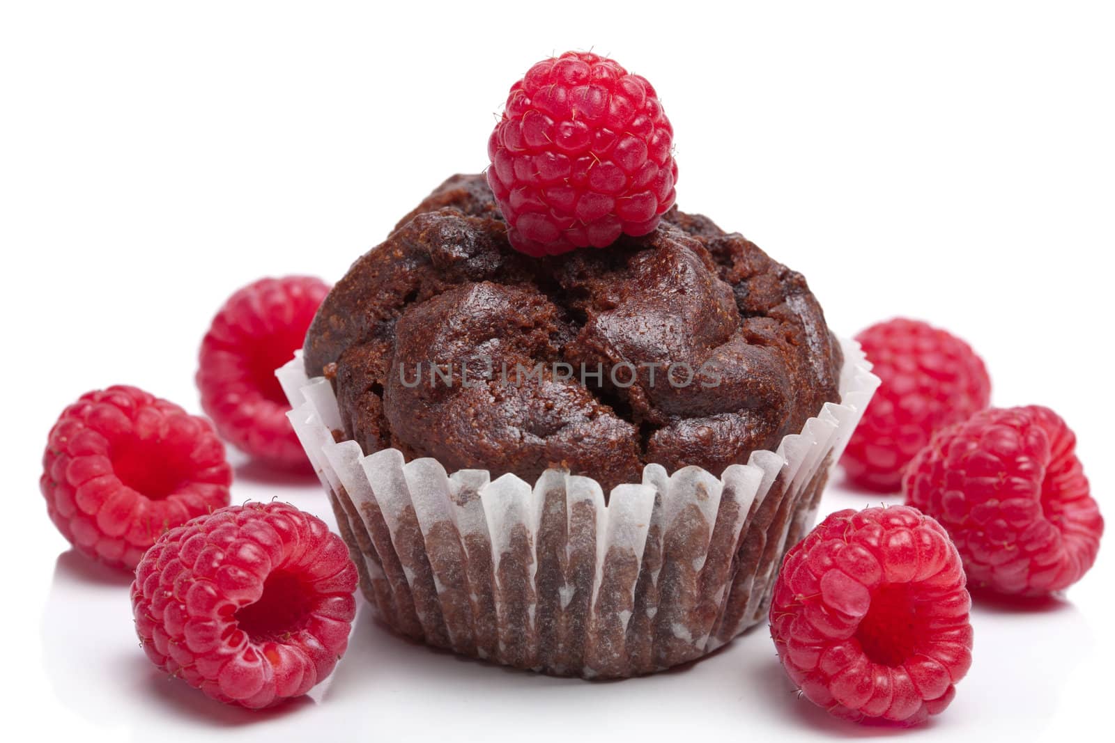 chocolate muffin with raspberry isolated 
