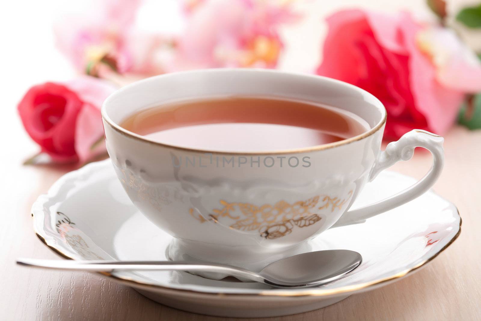 cup of tea and roses