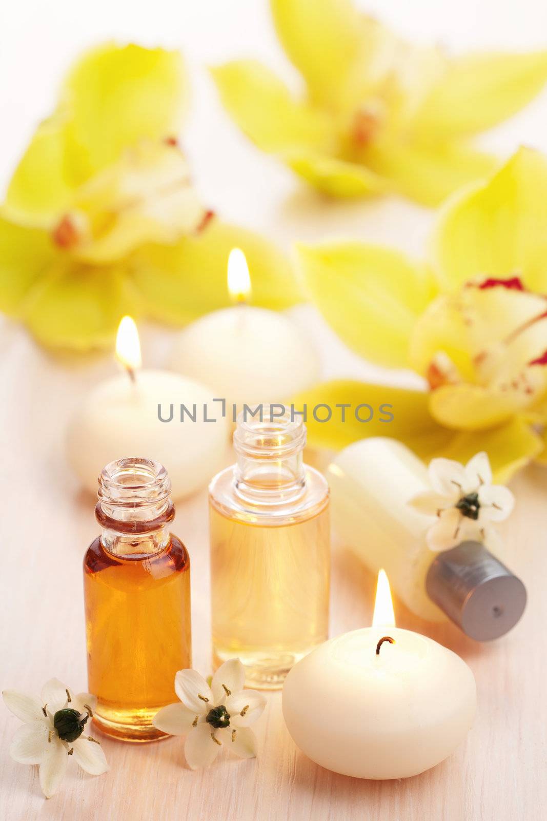 spa set with essential oils and flowers 