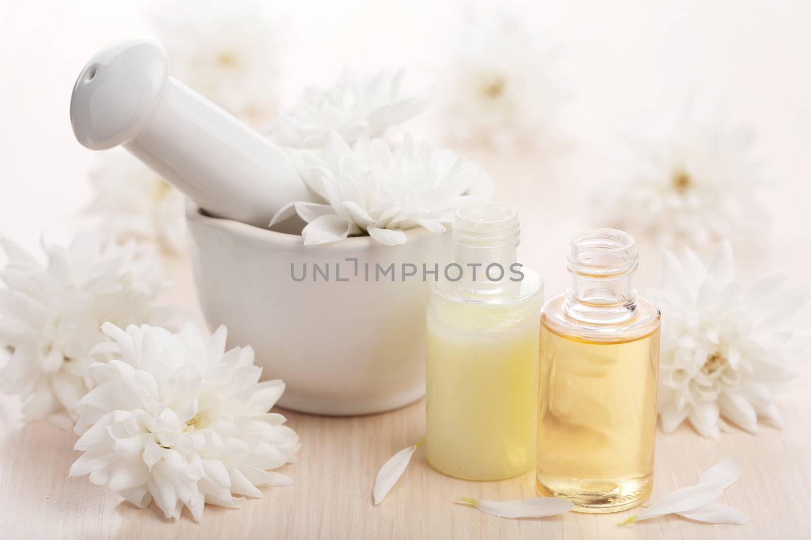 flower essential oil and mortar 