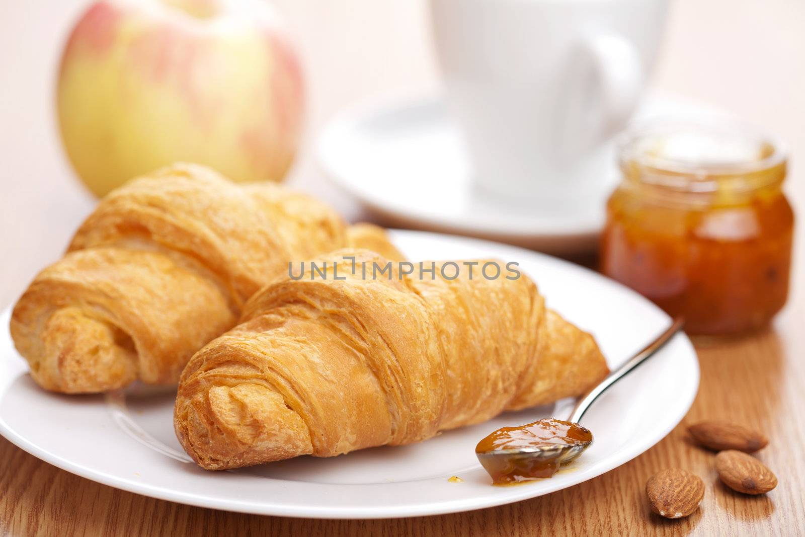 croissant with jam for breakfast