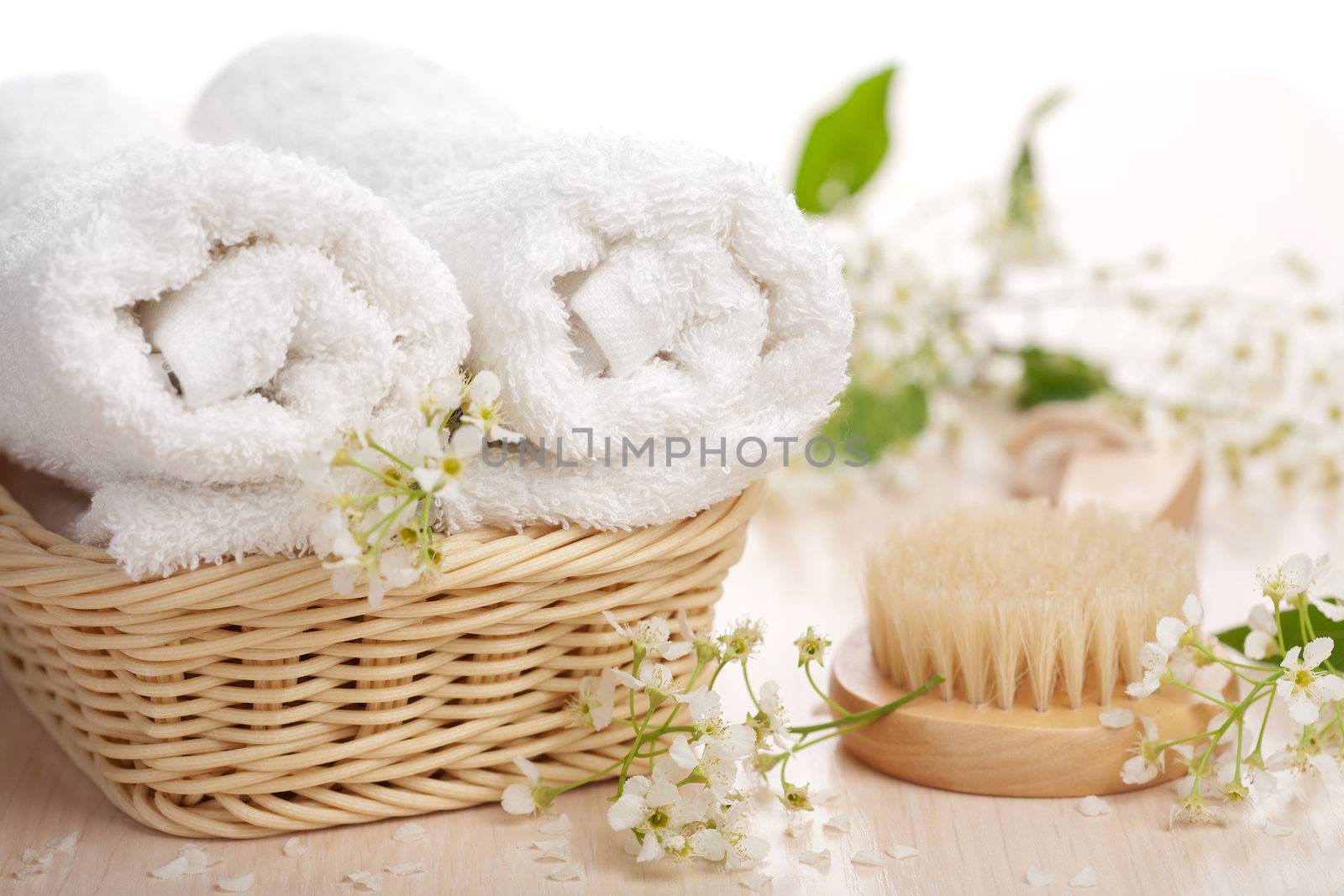 towels flowers and massage brush