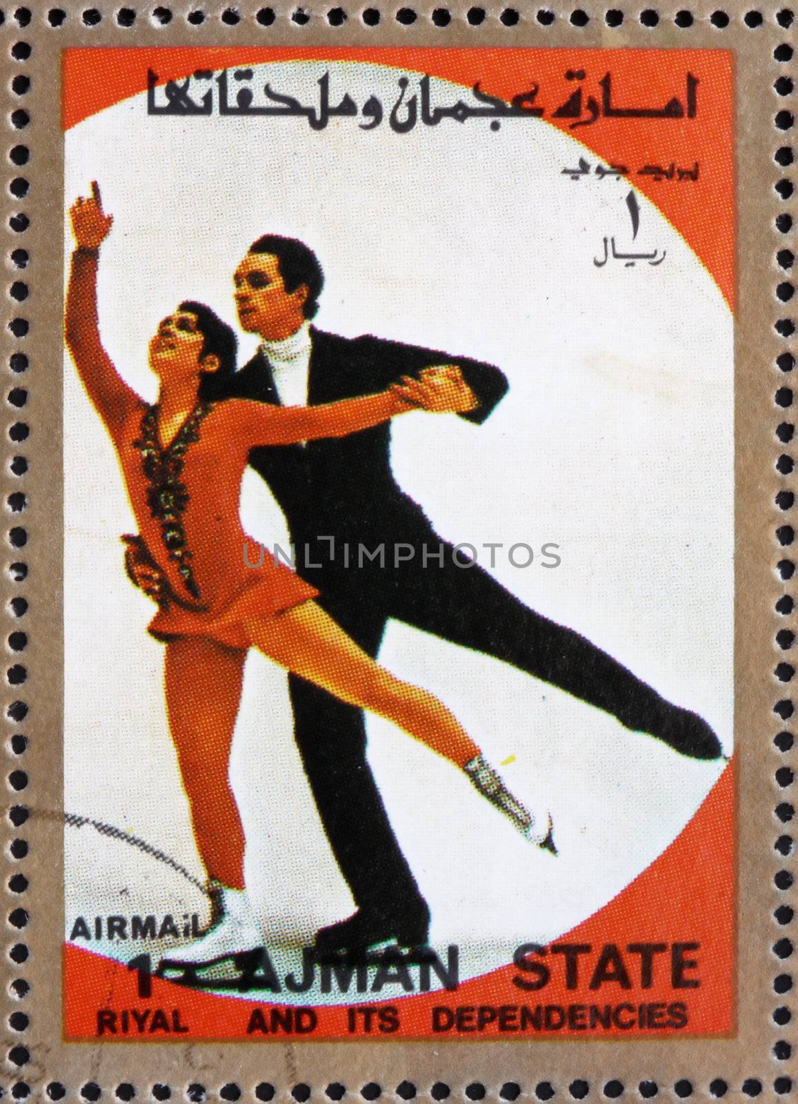 AJMAN - CIRCA 1973: a stamp printed in the Ajman shows Figure Skating, Ice Dancing, Winter Olympics, circa 1973