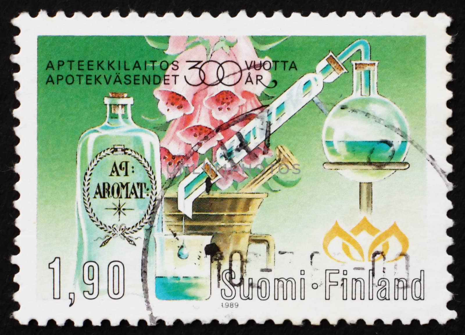 FINLAND - CIRCA 1989: a stamp printed in the Finland shows Foxglove, Distilling Apparatus, Mortar and Flask, 300th Anniversary of Finnish Pharmacies, circa 1989