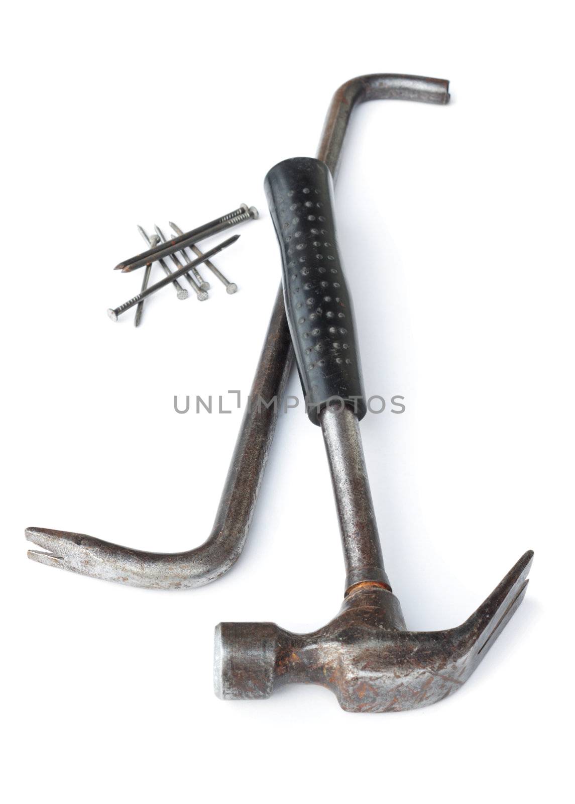 The old hammer and nail puller on white