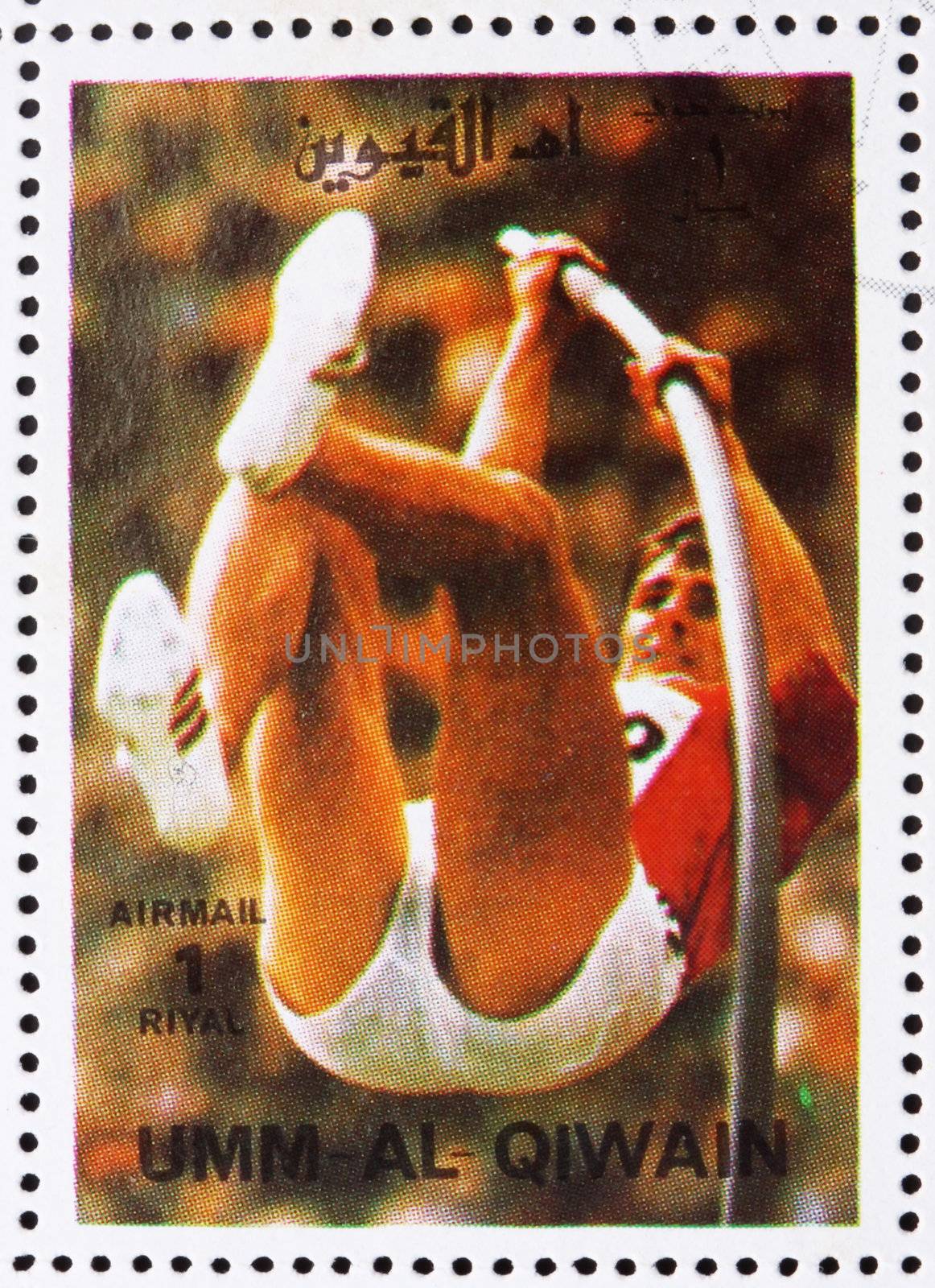UMM AL-QUWAIN - CIRCA 1972: a stamp printed in the Umm al-Quwain shows Pole Vault, High Jump, Athletics, Summer Olympics, Munich 1972, circa 1972