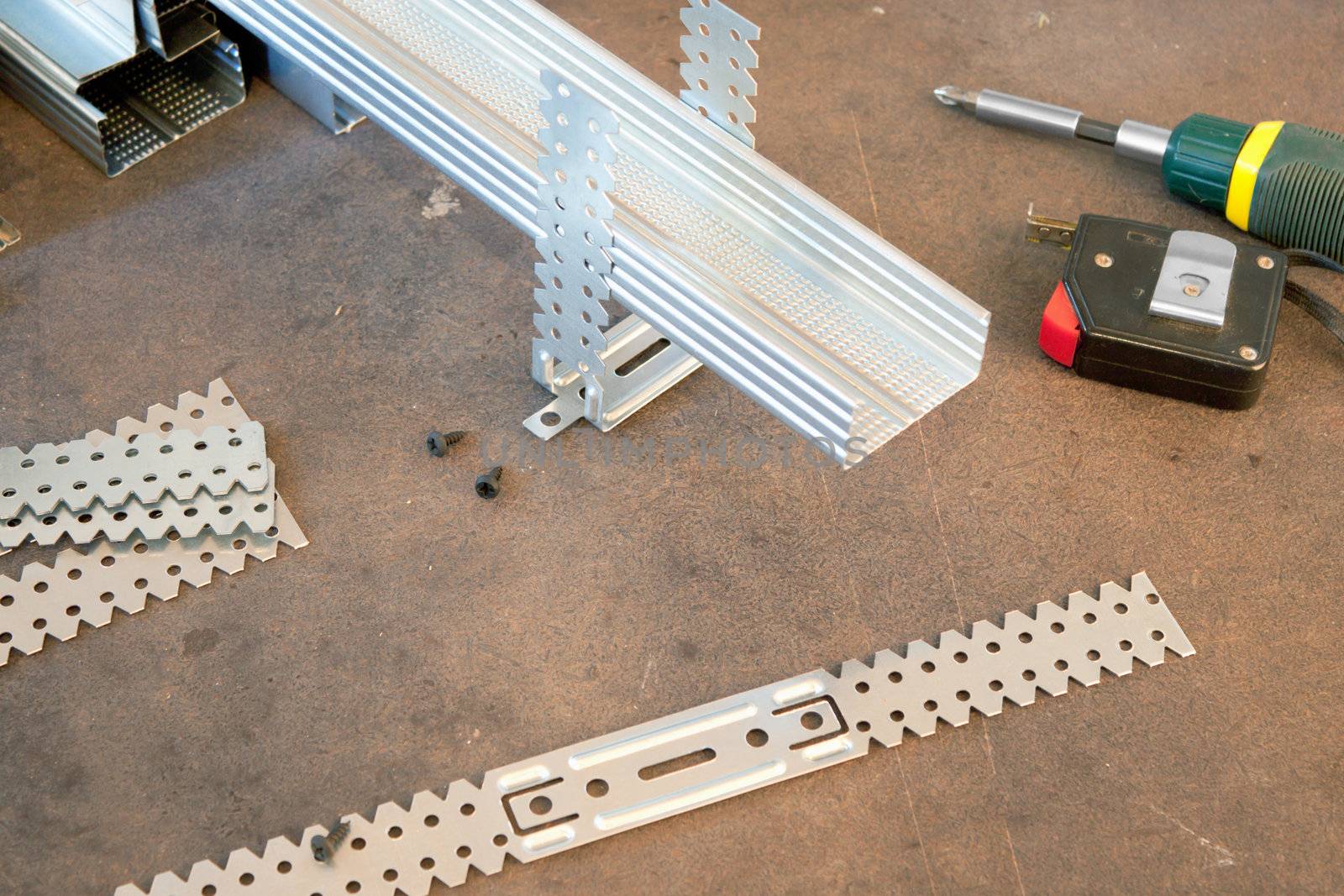 Parts for installation drywall and tools on the floor
