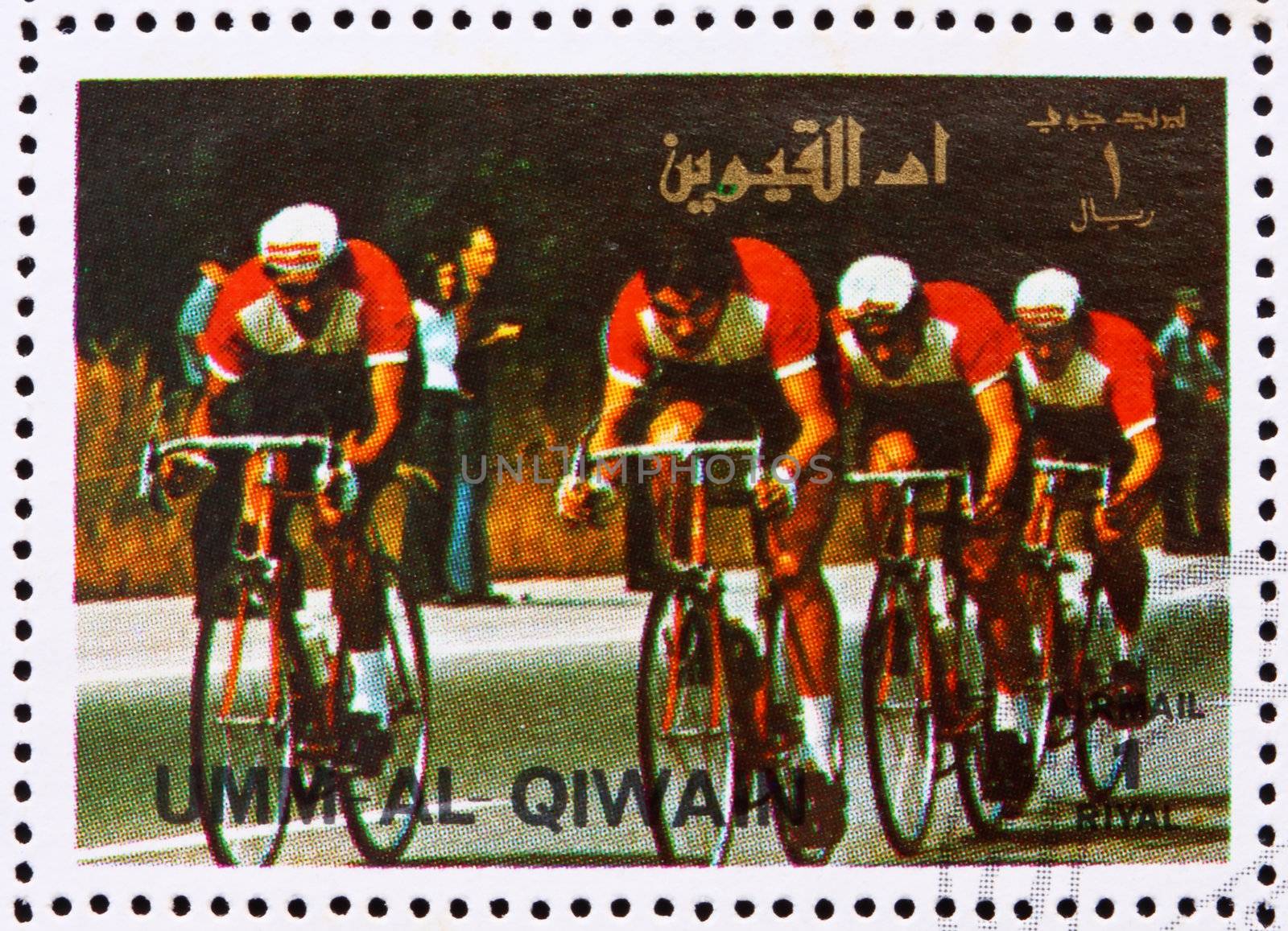 UMM AL-QUWAIN - CIRCA 1972: a stamp printed in the Umm al-Quwain shows Cycling, Summer Olympics, Munich 1972, circa 1972