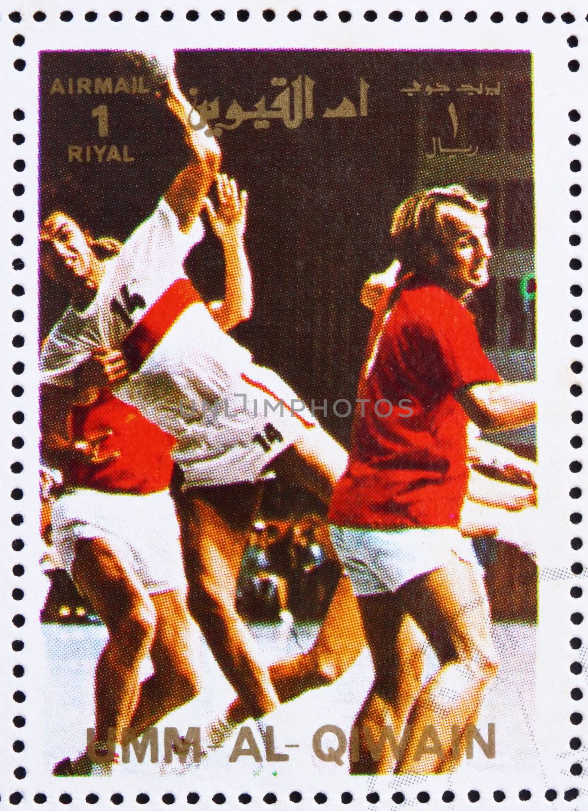 UMM AL-QUWAIN - CIRCA 1972: a stamp printed in the Umm al-Quwain shows Handball, Summer Olympics, Munich 1972, circa 1972