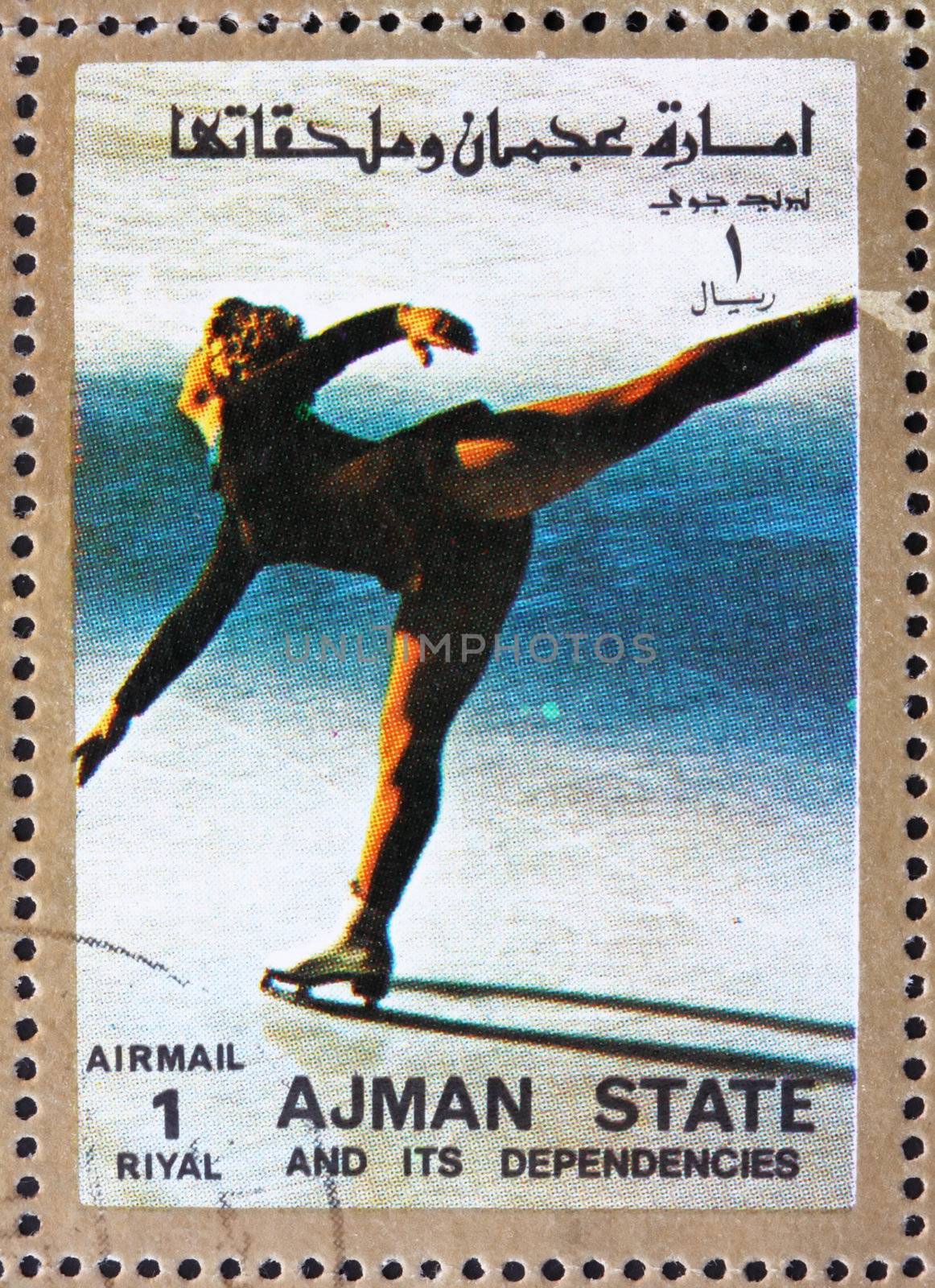AJMAN - CIRCA 1973: a stamp printed in the Ajman shows Figure Skating, Ice Dancing, Winter Olympics, circa 1973
