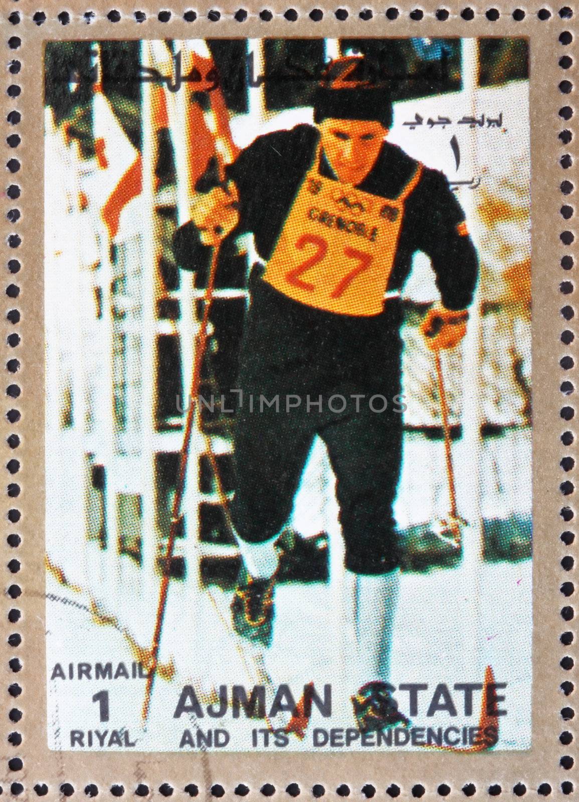 AJMAN - CIRCA 1973: a stamp printed in the Ajman shows Cross-country Skiing, Winter Olympics, circa 1973