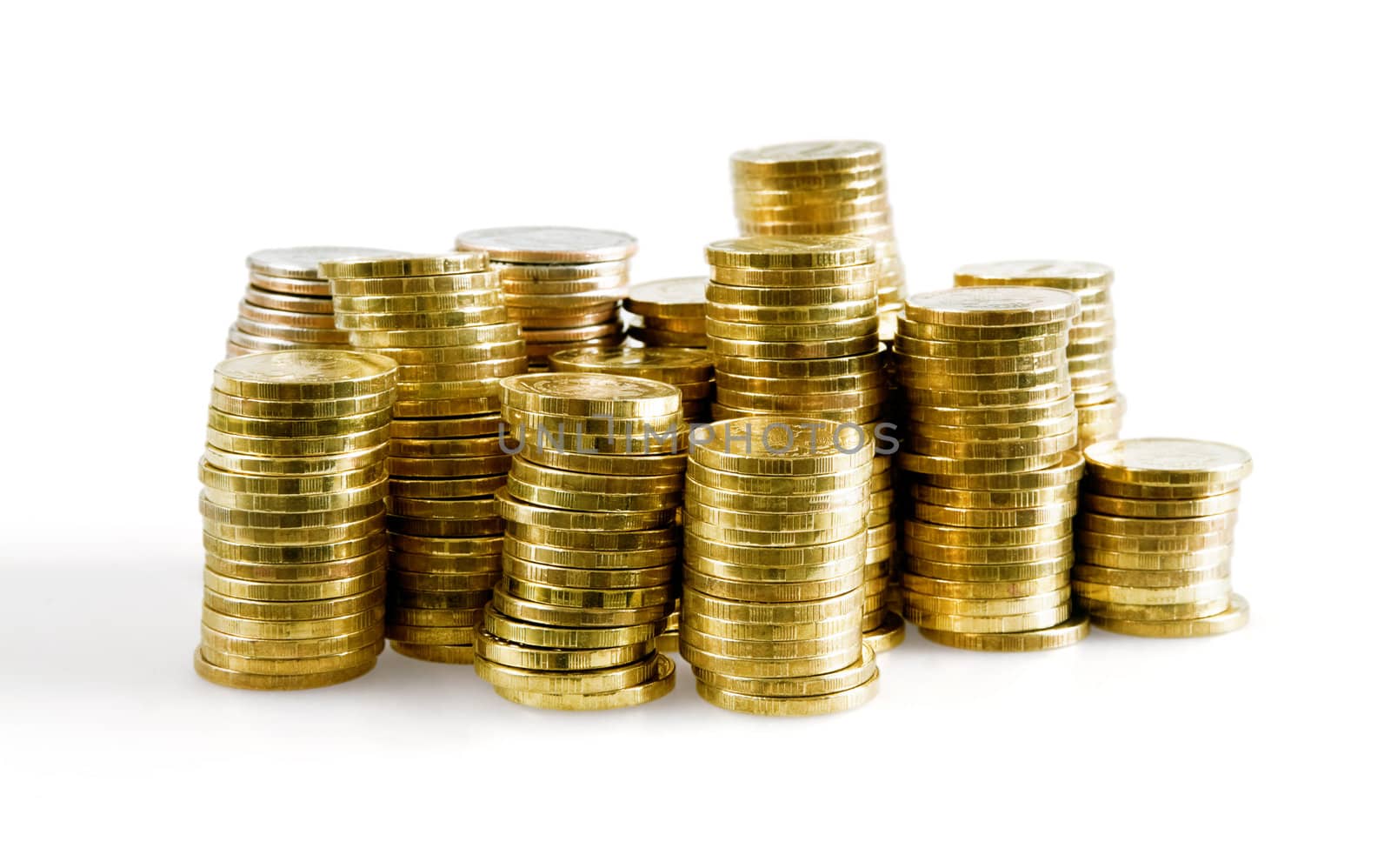 pile of brilliant metallic coins on a white background