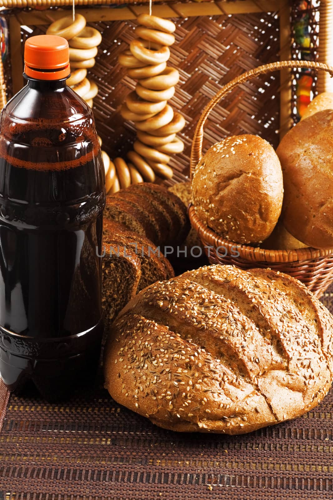 Kvass and grain products as natural food background by Serp
