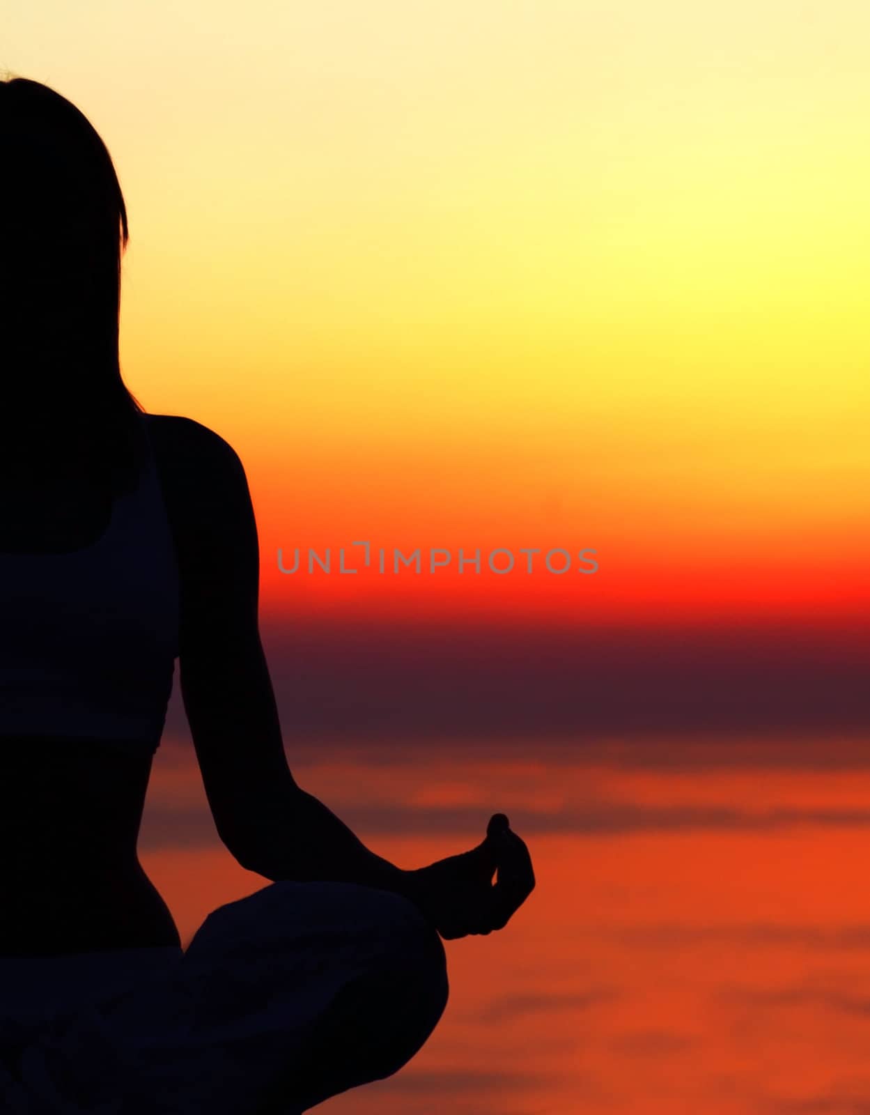 Yoga woman over sunset by Anna_Omelchenko