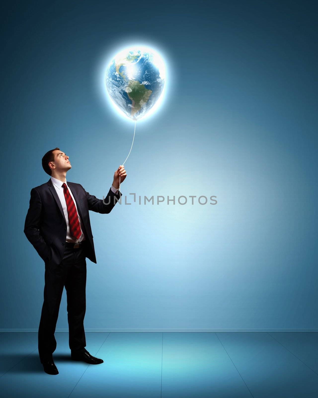 Light bulb and a business person as symbols of creativity in business