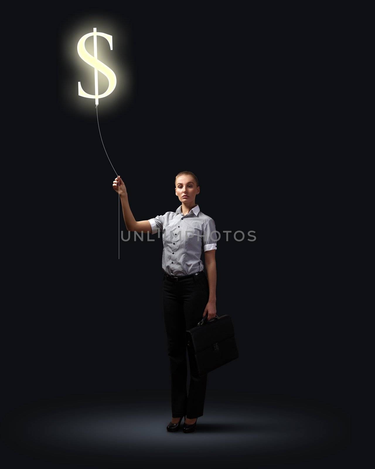 Light bulb and a business person as symbols of creativity in business