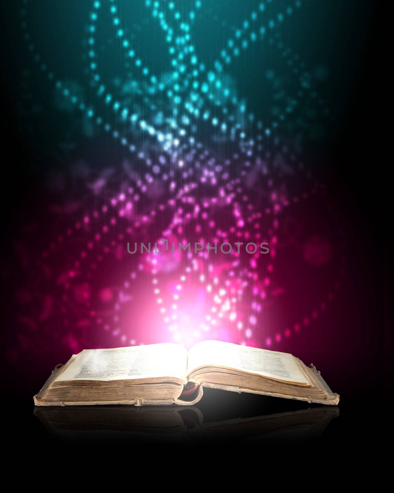 Magic book with light coming from inside it